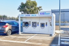 Supermarket car park laundrette, found in many places across France, Spain and increasingly in other countries.