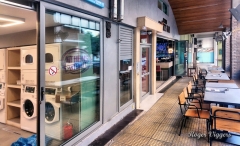 Laundrette next to the Sports Bar, Veikou, Athens, Greece. Laundrette next to the Sports Bar, Veikou, Athens, Greece.
